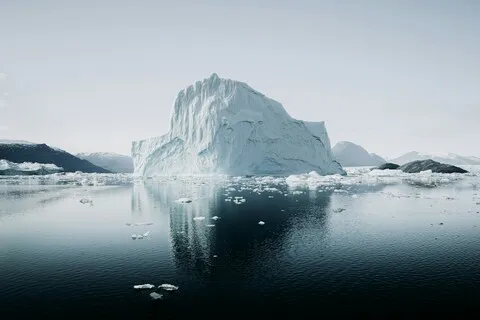 Iceberg with the majority of its mass submerged below the waterline, illustrating hidden distortions in backtest results.