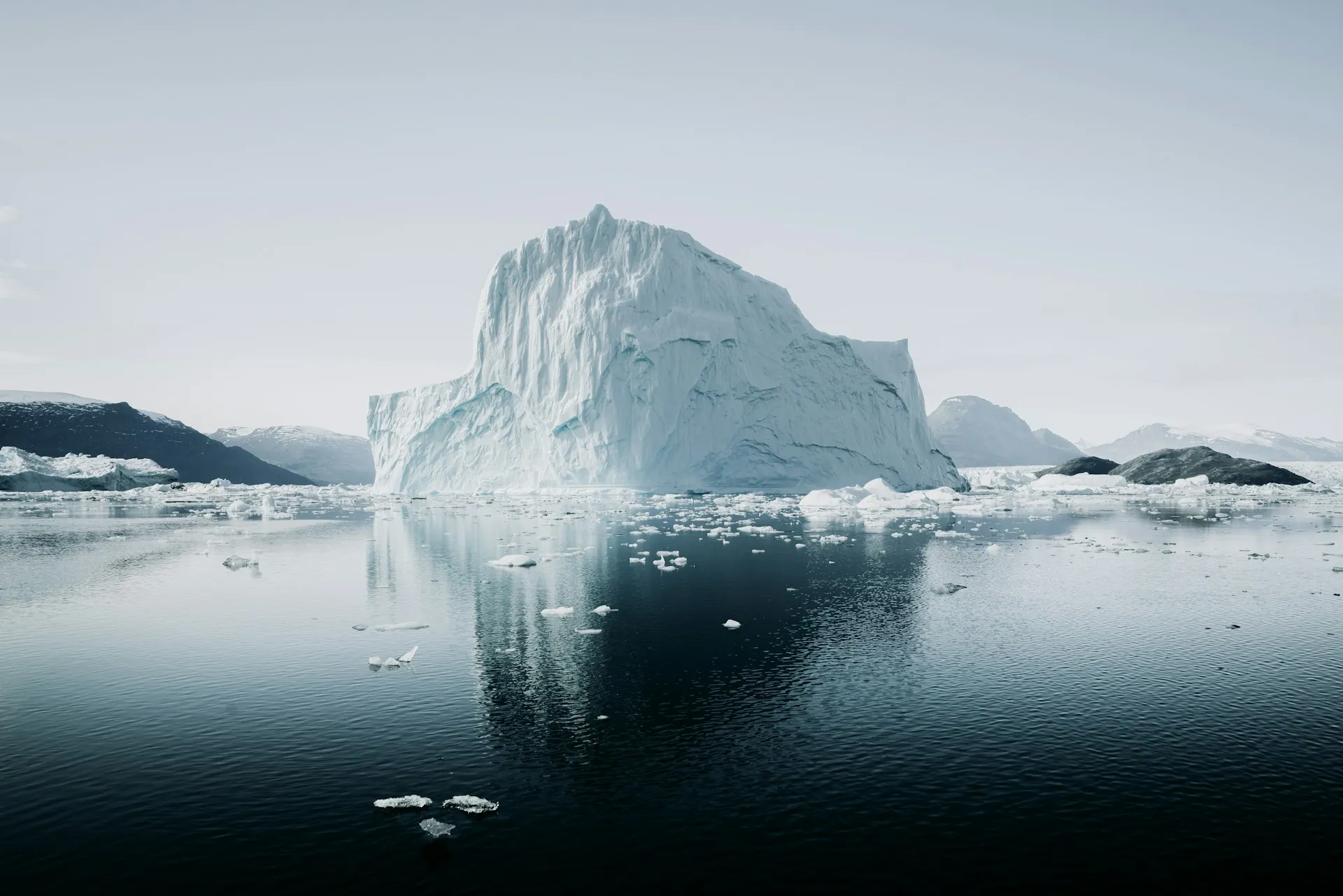 Iceberg with the majority of its mass submerged below the waterline, illustrating hidden distortions in backtest results.